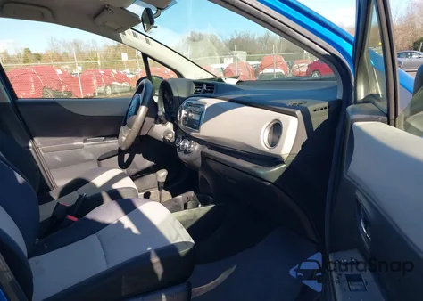 2013 Toyota Yaris Le z USA, uszkodzony, nr VIN JTDKTUD32DD563433